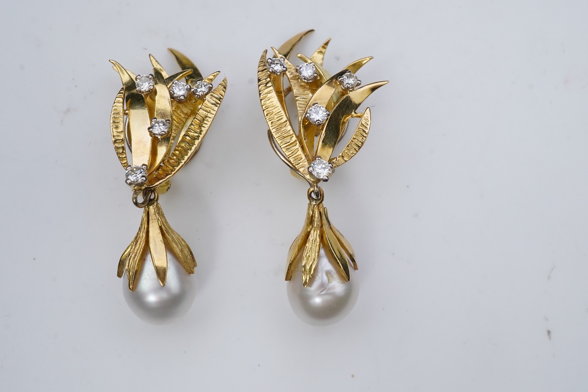 A pair of aquamarine, cultured pearl and diamond ear clips, third quarter 20th century